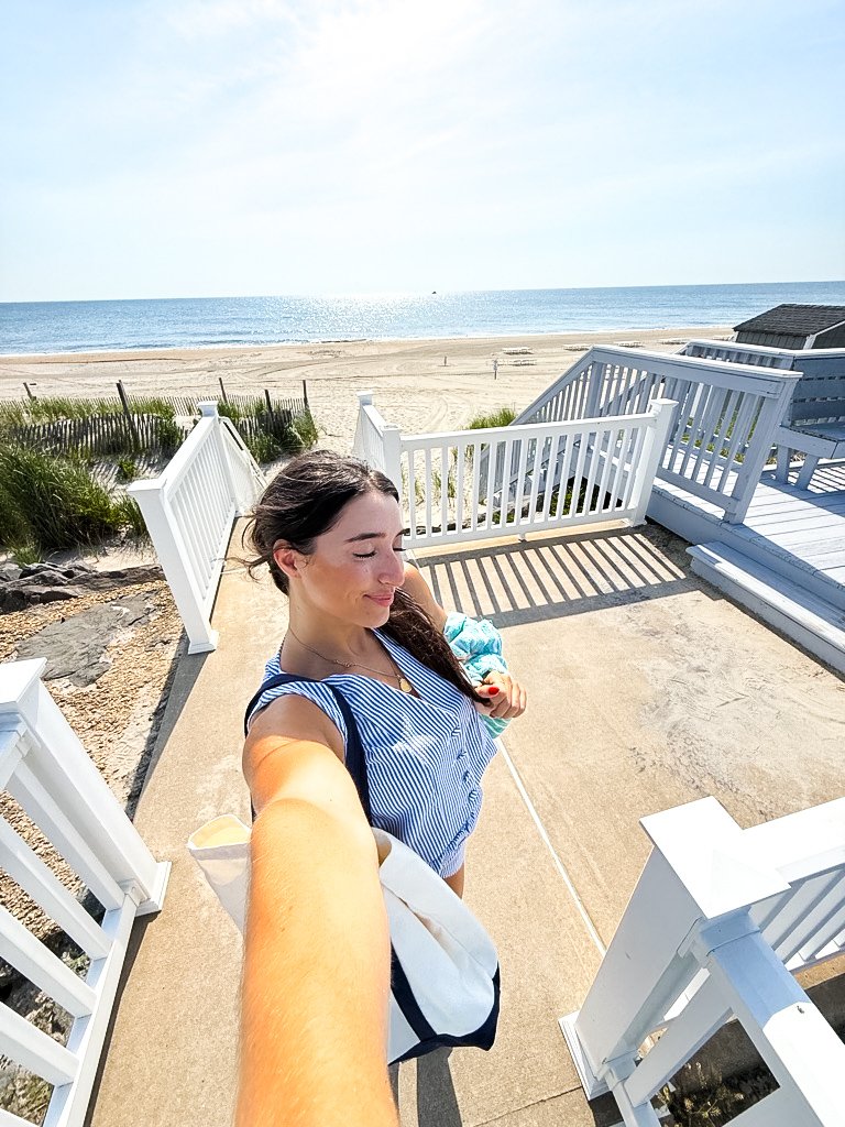 Amanda on a beach house deck